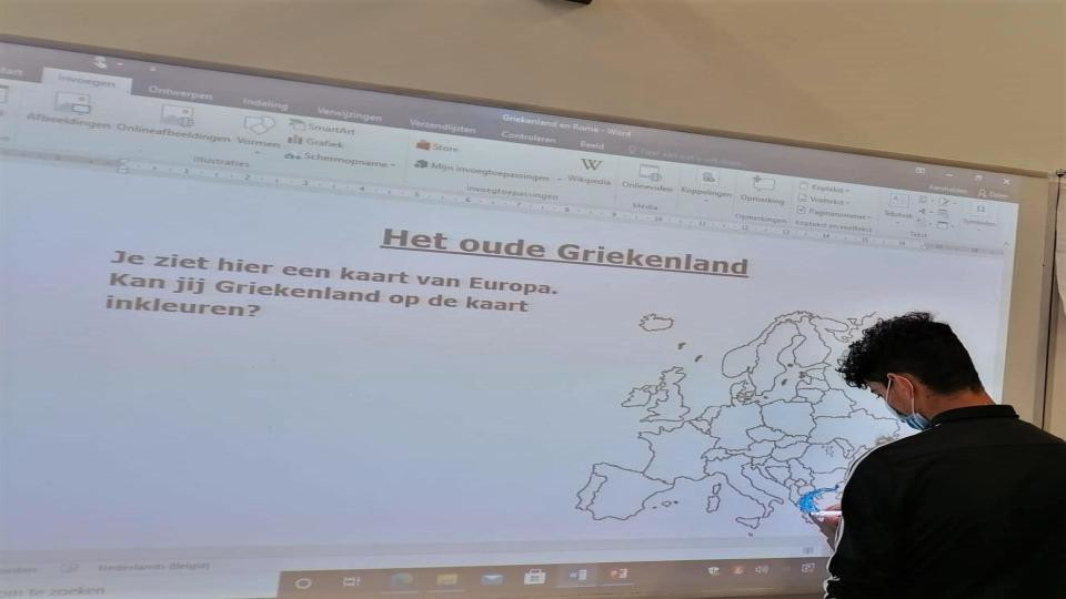 OKAN presentatie jongen bord